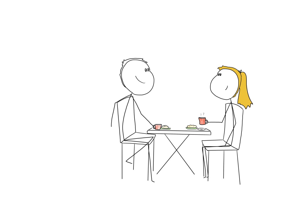 A man and a woman on a date having a coffee.