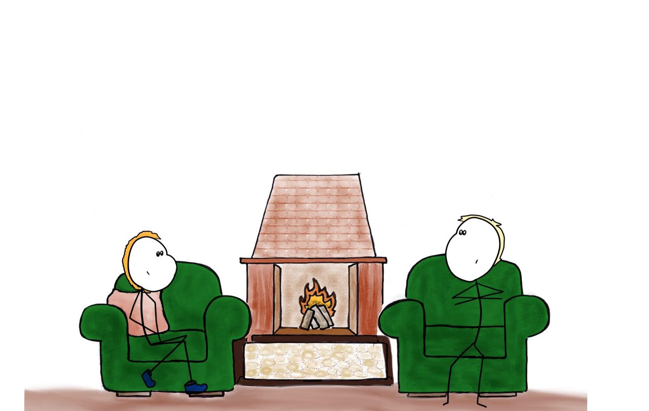 Two people sitting by the fireplace talking.