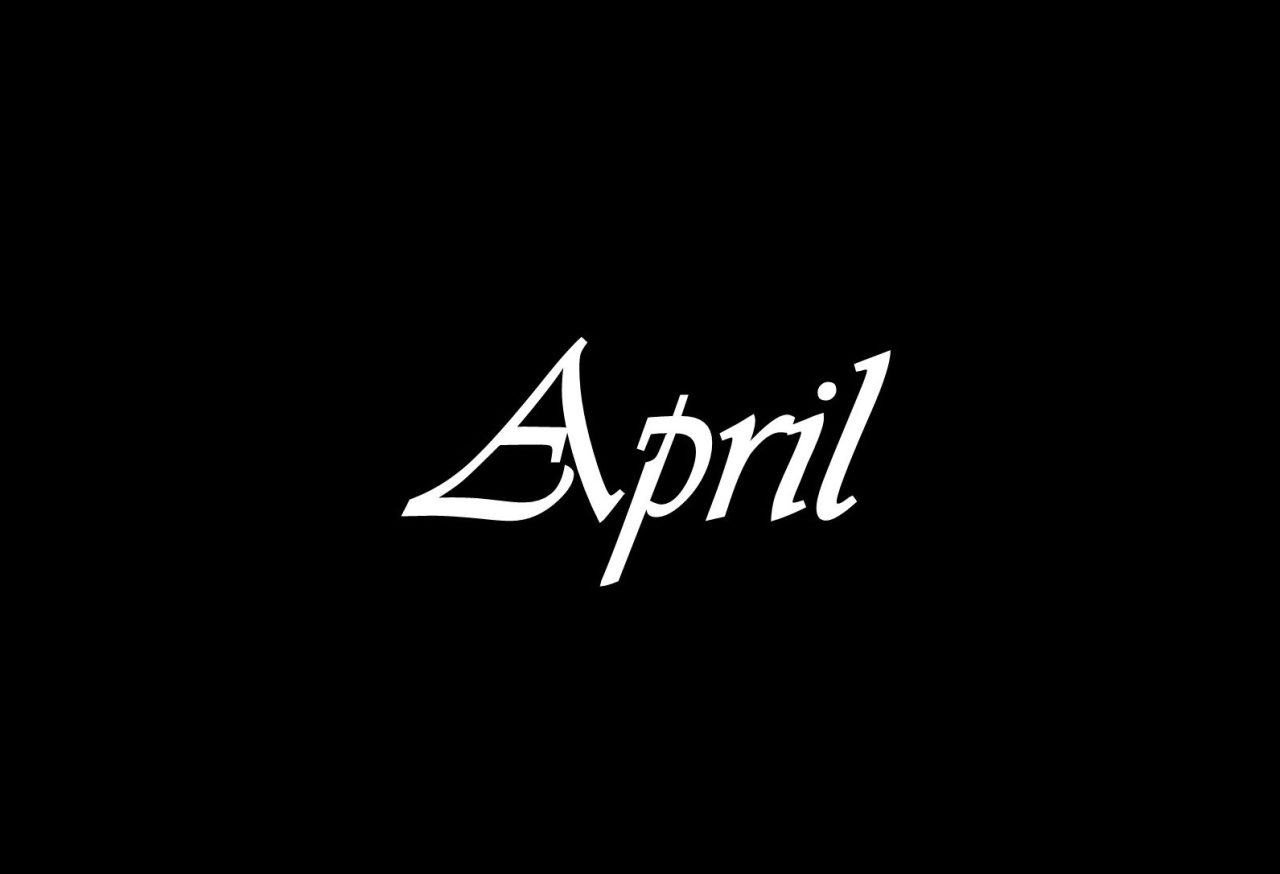 April med hvit tekst på sort bakgrunn.