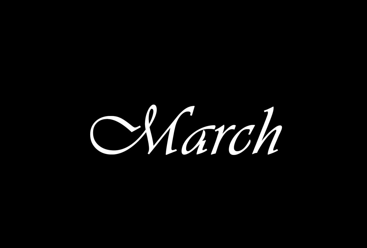 The month March written in white on a black background