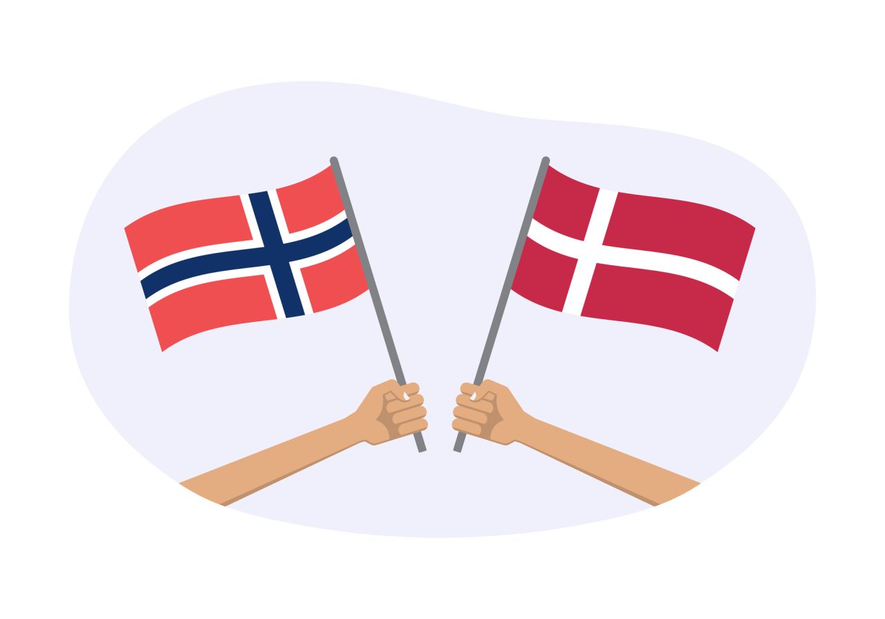 To hender som holder hvert sitt flagg. Norsk og dansk.