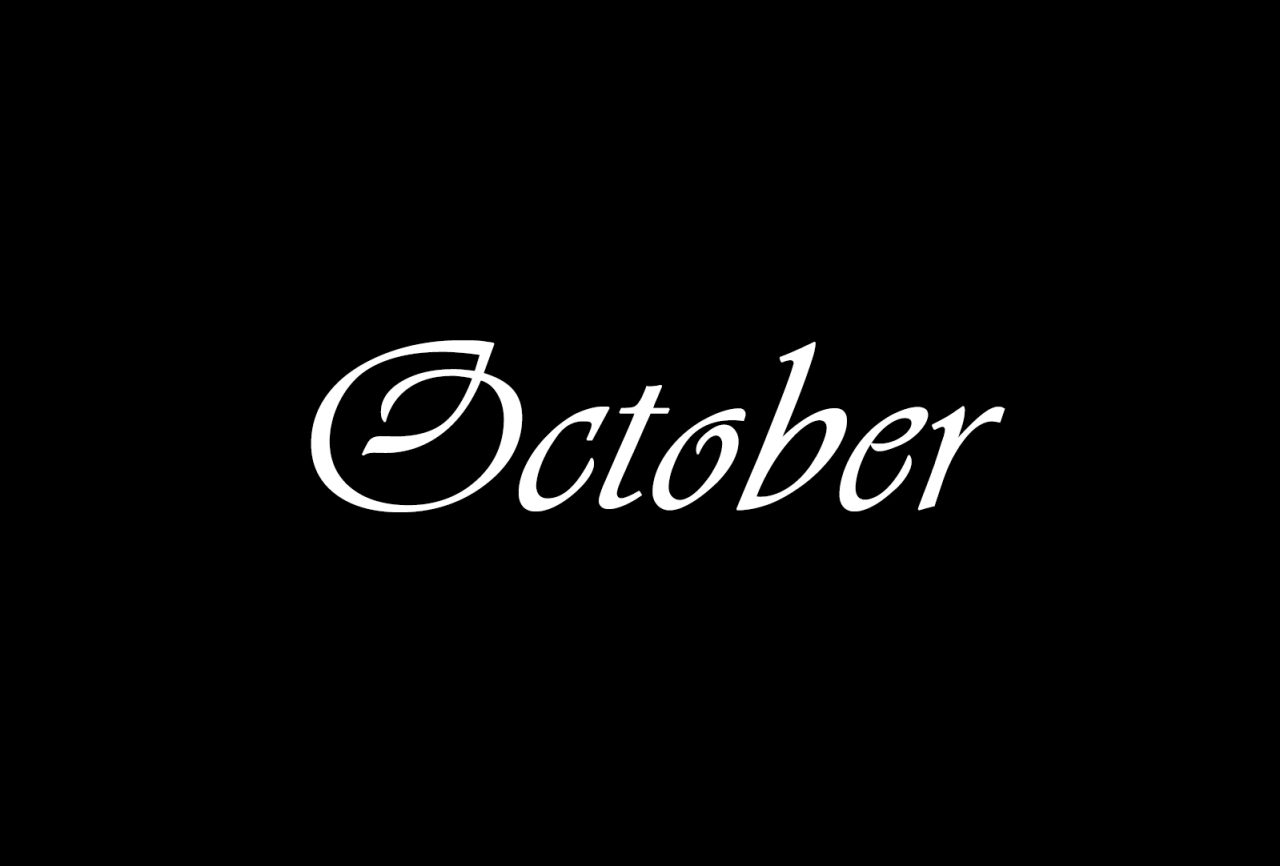 The month October written in white on a black background